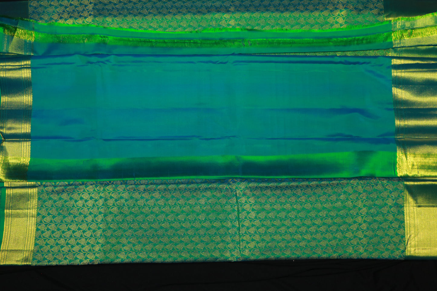 Brocade Silk -Body-Rich Emerald Green-Gold zari-geometric buttas-Border-Emerald Green -Broad Gold zari