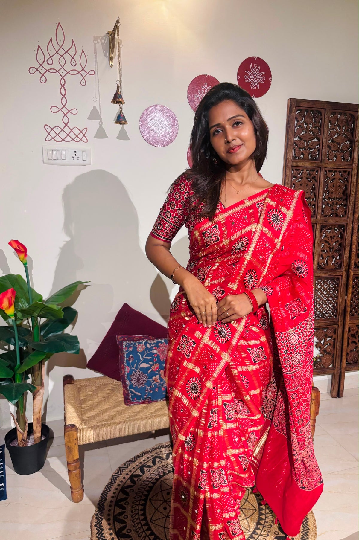 Red Bandhini Gharchola saree with mirror work and Gota Patti embellishment
