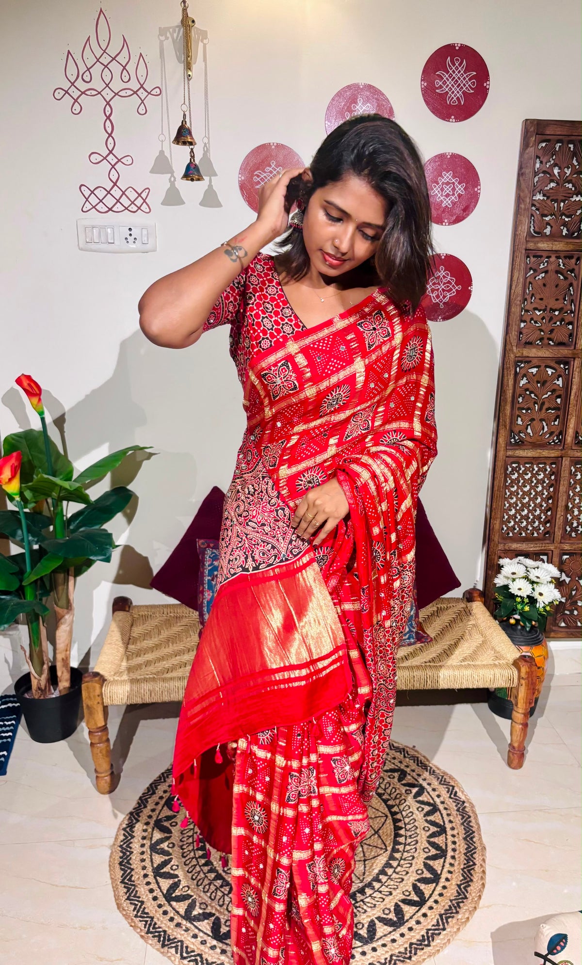 Red Bandhini Gharchola saree with mirror work and Gota Patti embellishment