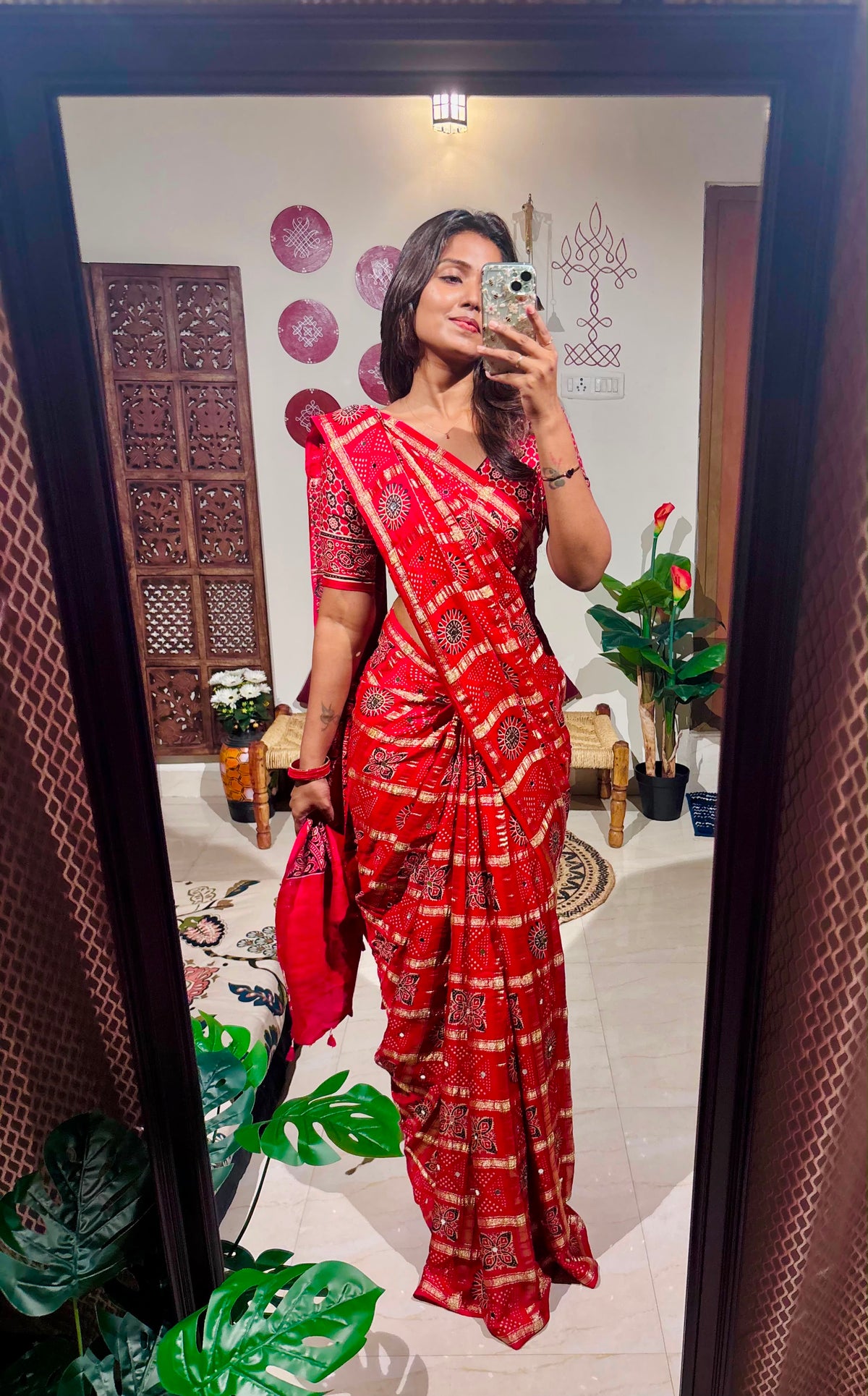 Red Bandhini Gharchola saree with mirror work and Gota Patti embellishment