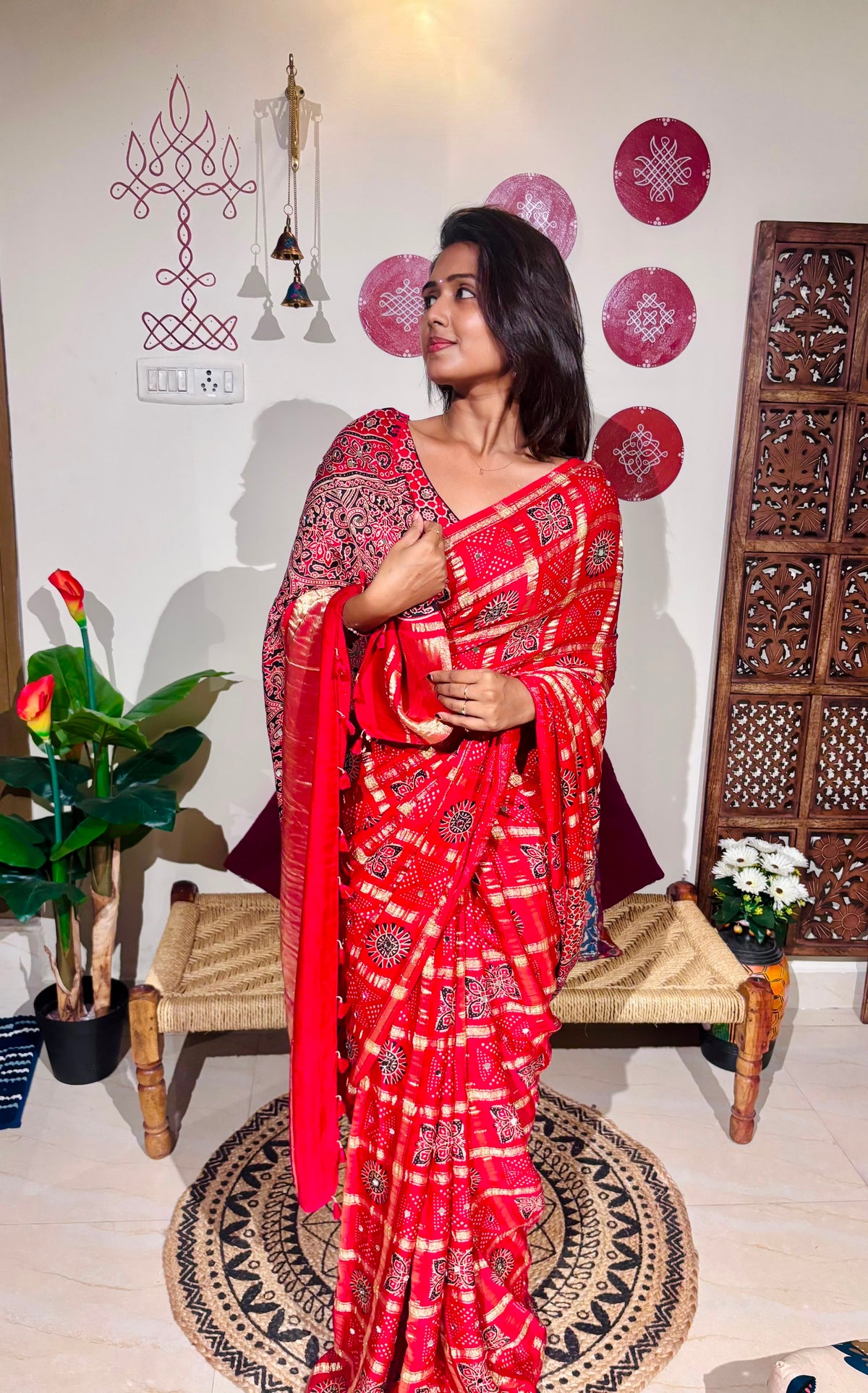 Red Bandhini Gharchola saree with mirror work and Gota Patti embellishment