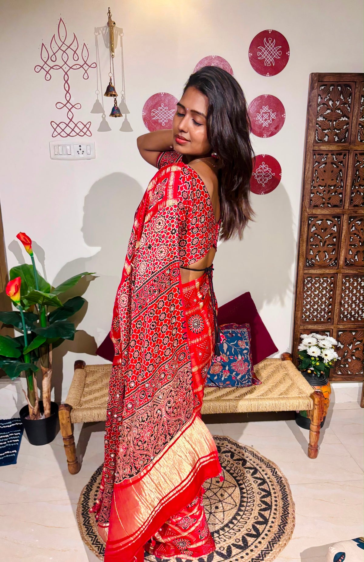 Red Bandhini Gharchola saree with mirror work and Gota Patti embellishment