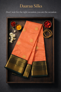 Kanchi Soft Silk Saree – Warm Peach Salmon with Round Gold Zari Buttas & Deep Olive Border
