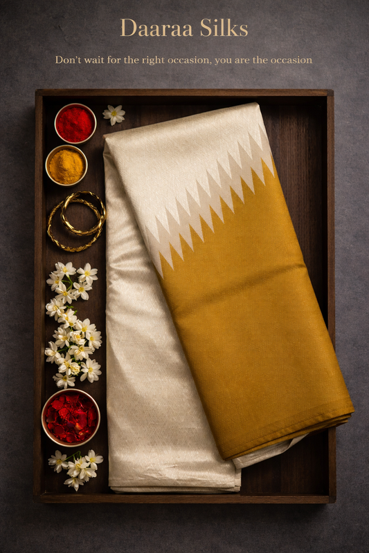 Kanchi Silk-Rising Temple Border-Body-Pale Gold-Warm Mustard Gold / Antique Gold -Pallu & Lower Section-Ivory–Beige Accents (Zigzag Pattern)