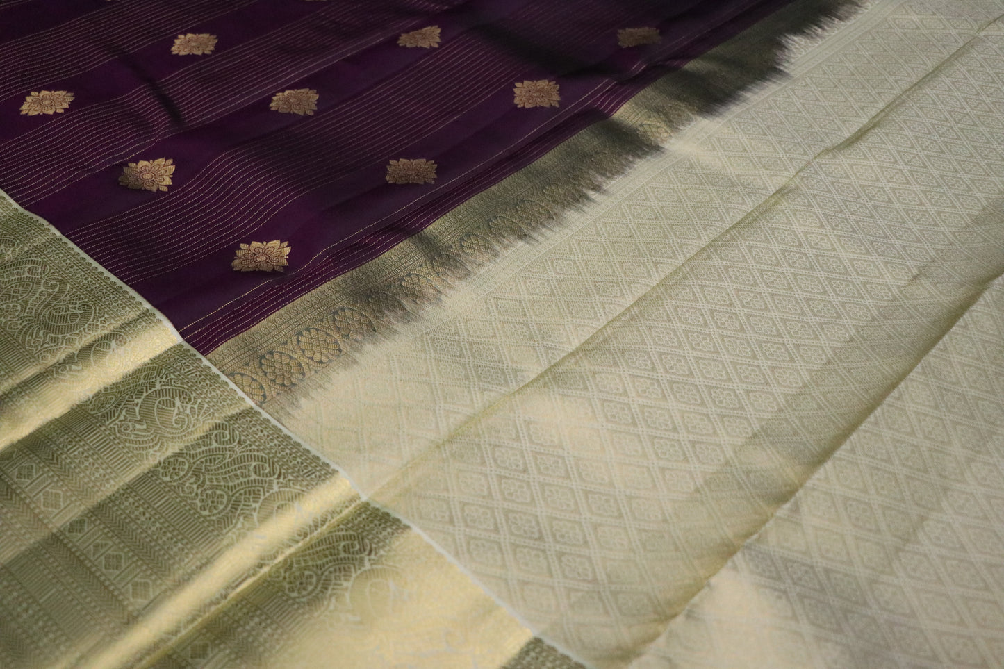 Kanchi Silk-Body-aubergine purple with gold zari buttas and fine vertical gold lines- Border-Soft antique gold