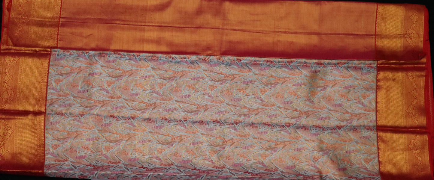 Kanchi Silk-Body-Soft peach–coral base-Mint green leafy motifs-Palu-Border-Rich burnt orange