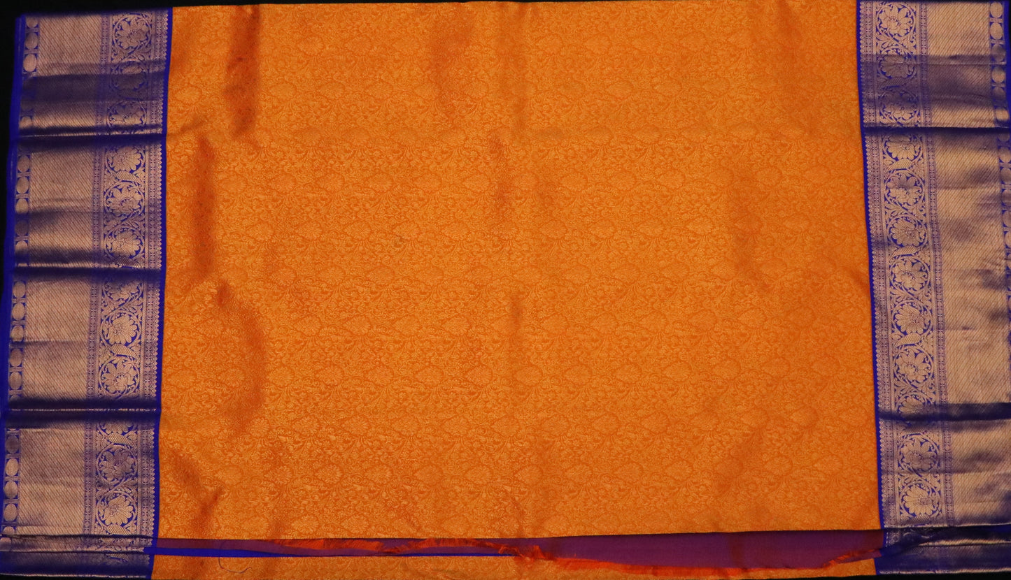 Kanchi Silk-jacquard floral jaal-Rich marigold orange with Royal cobalt blue border and pallu