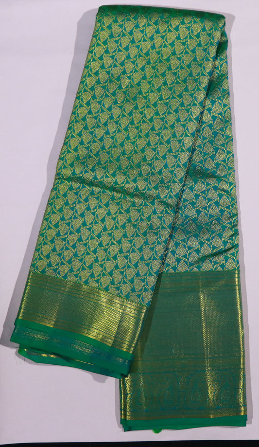 Kanchi Brocade Silk Saree – Rich Emerald Green with Gold Zari Geometric Buttas
