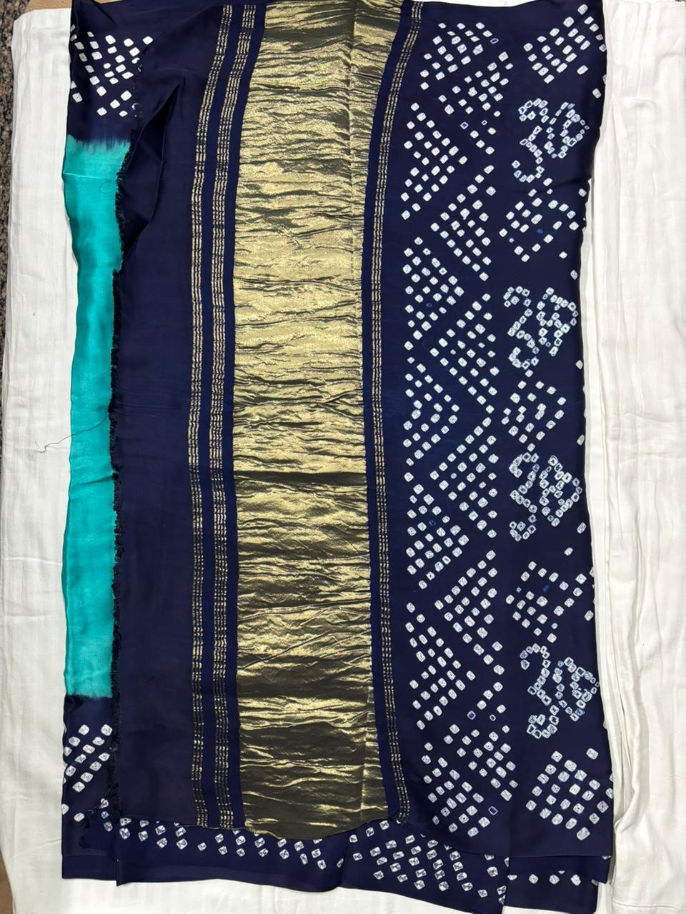 Modal Silk 2D Chakkar Bandhej Saree – Green Body with Blue Pallu