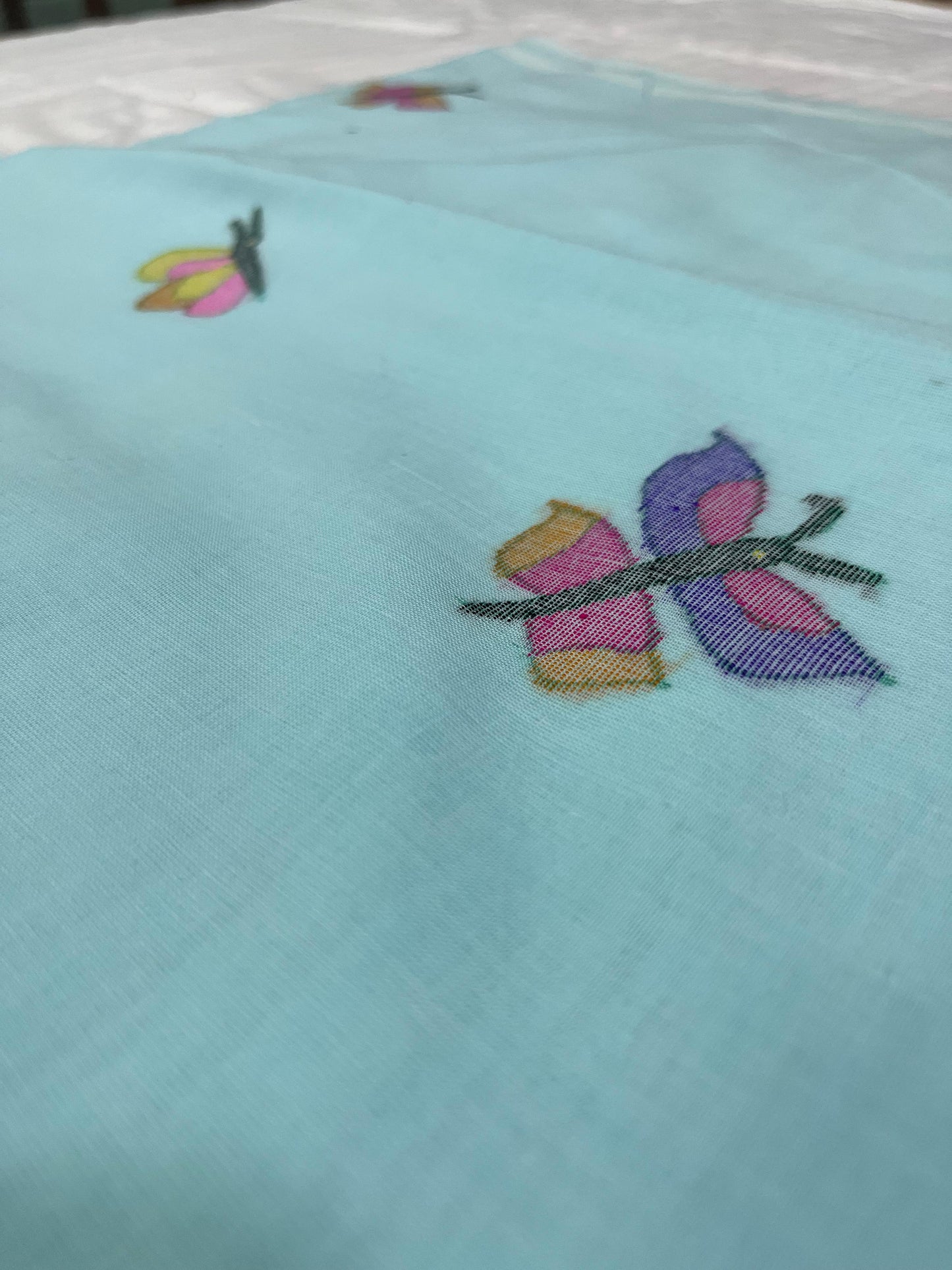 Mulmul Cotton Saree – Aqua Blue with Butterfly Motifs