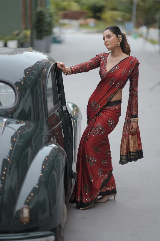 Brick red Ajrak hand block print saree with mirror work
