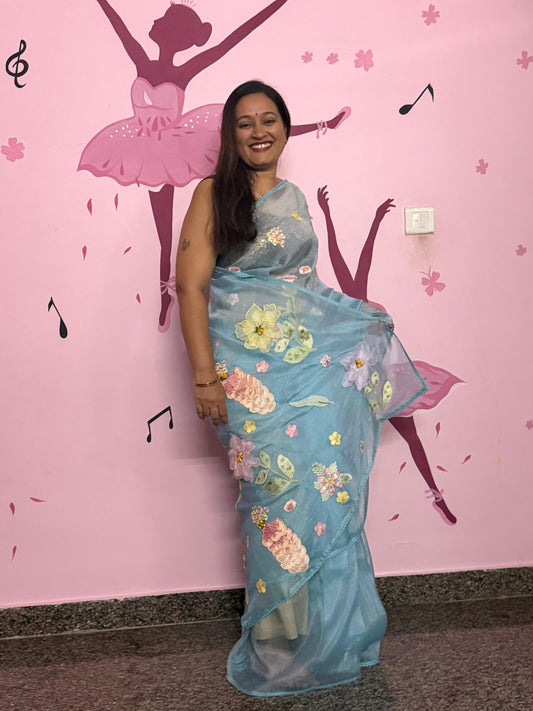 Sea Blue Organza Saree with 3D Floral Appliqué | Pearl & Sequin Border