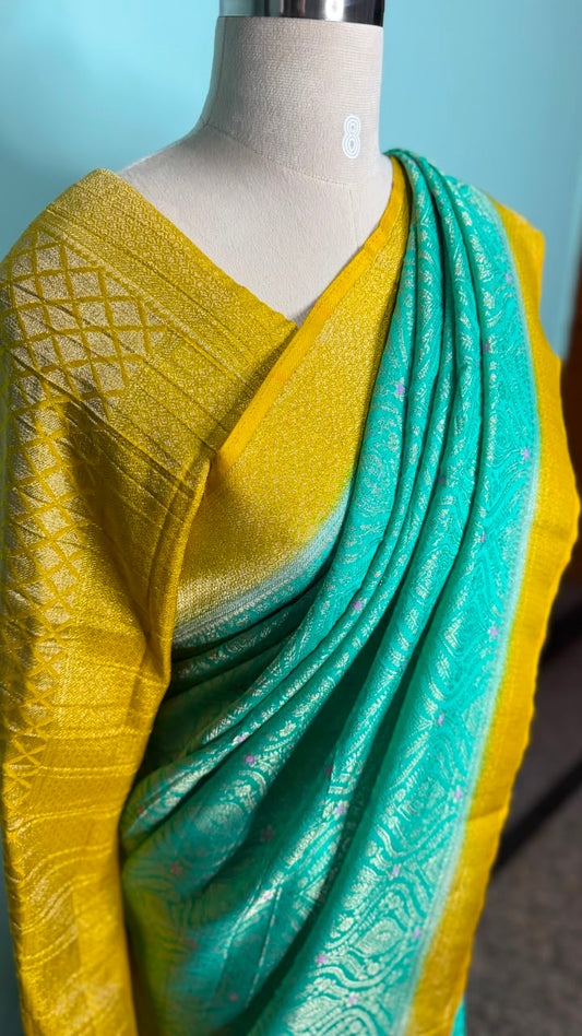 Sea green Semi Banarasi georgette saree with yellow Banarasi-inspired zari border, Daaraa Silks