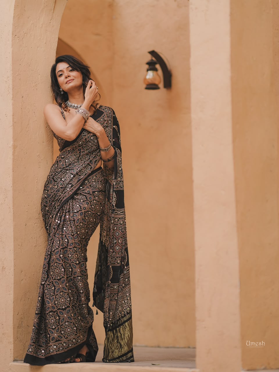 Black Ajrak hand block print saree with mirror work