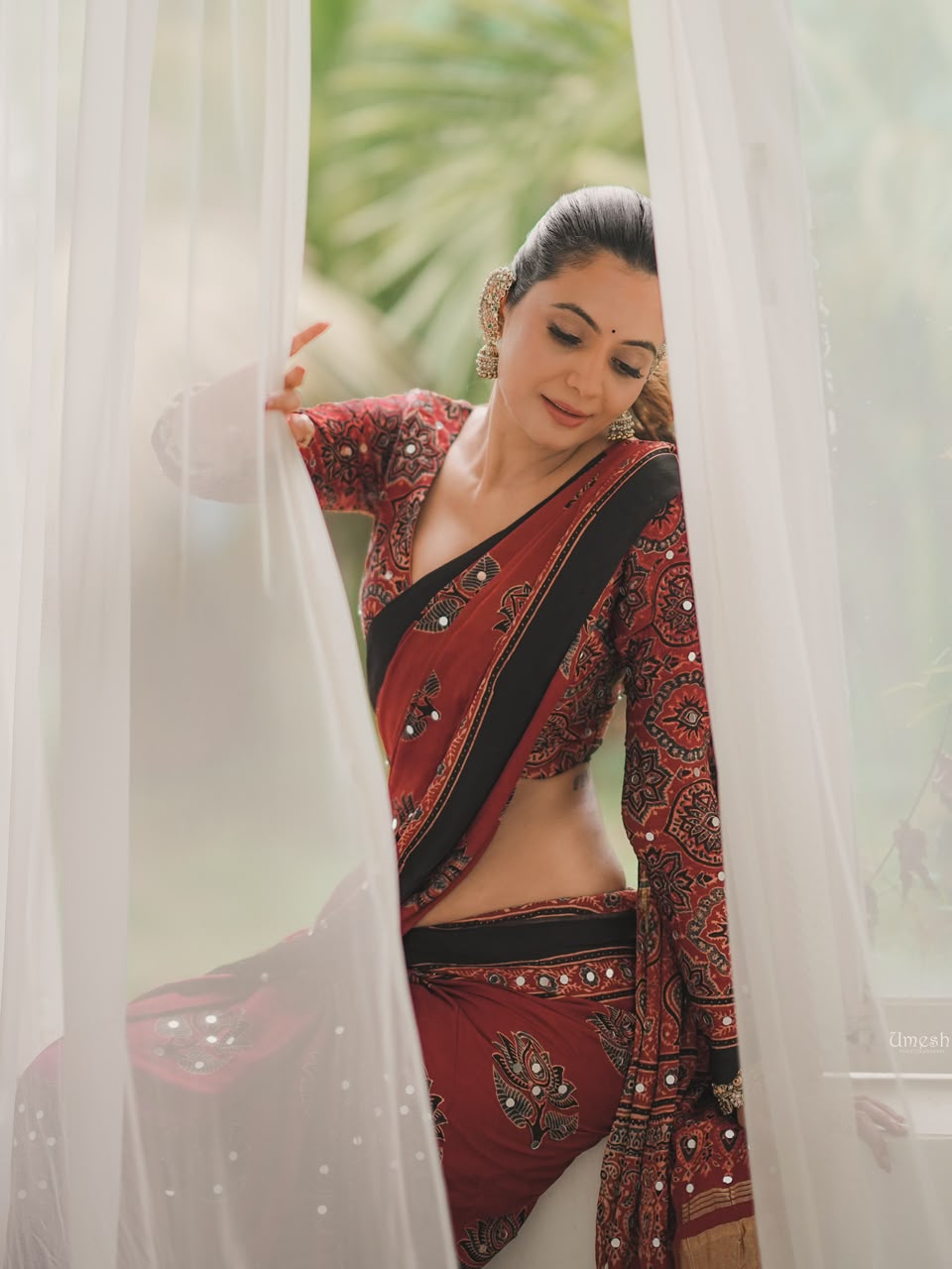 Brick red Ajrak hand block print saree with mirror work